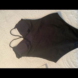Brand new, solid black one piece swimsuit